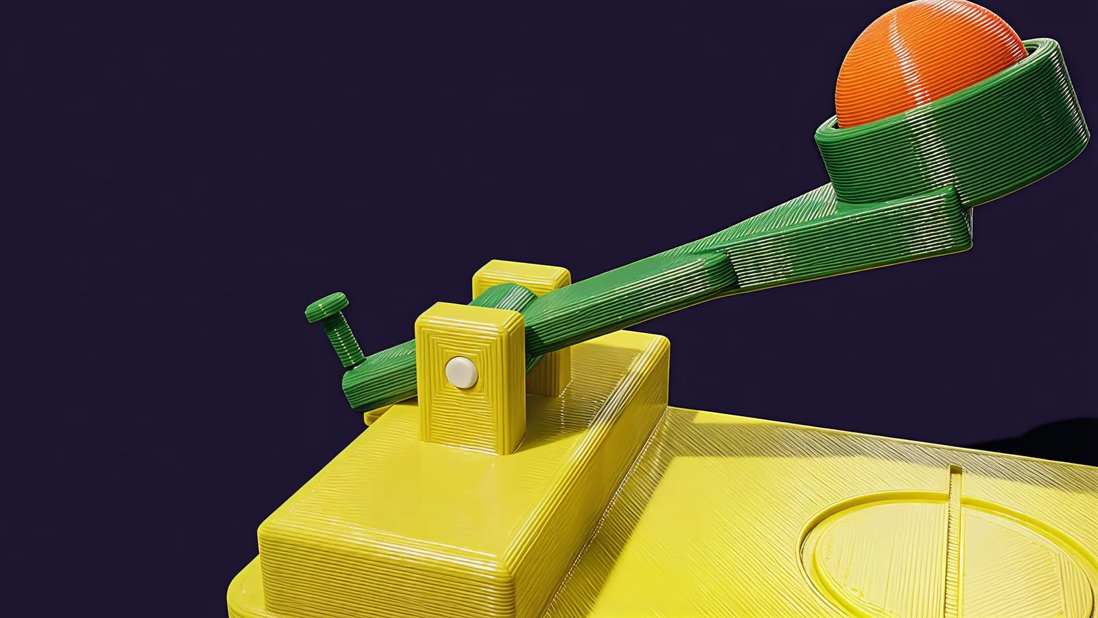 Close view of the hinge: the green lever passes between two yellow-green posts on a raised block, held by a white pin, with a small peg at its back end.