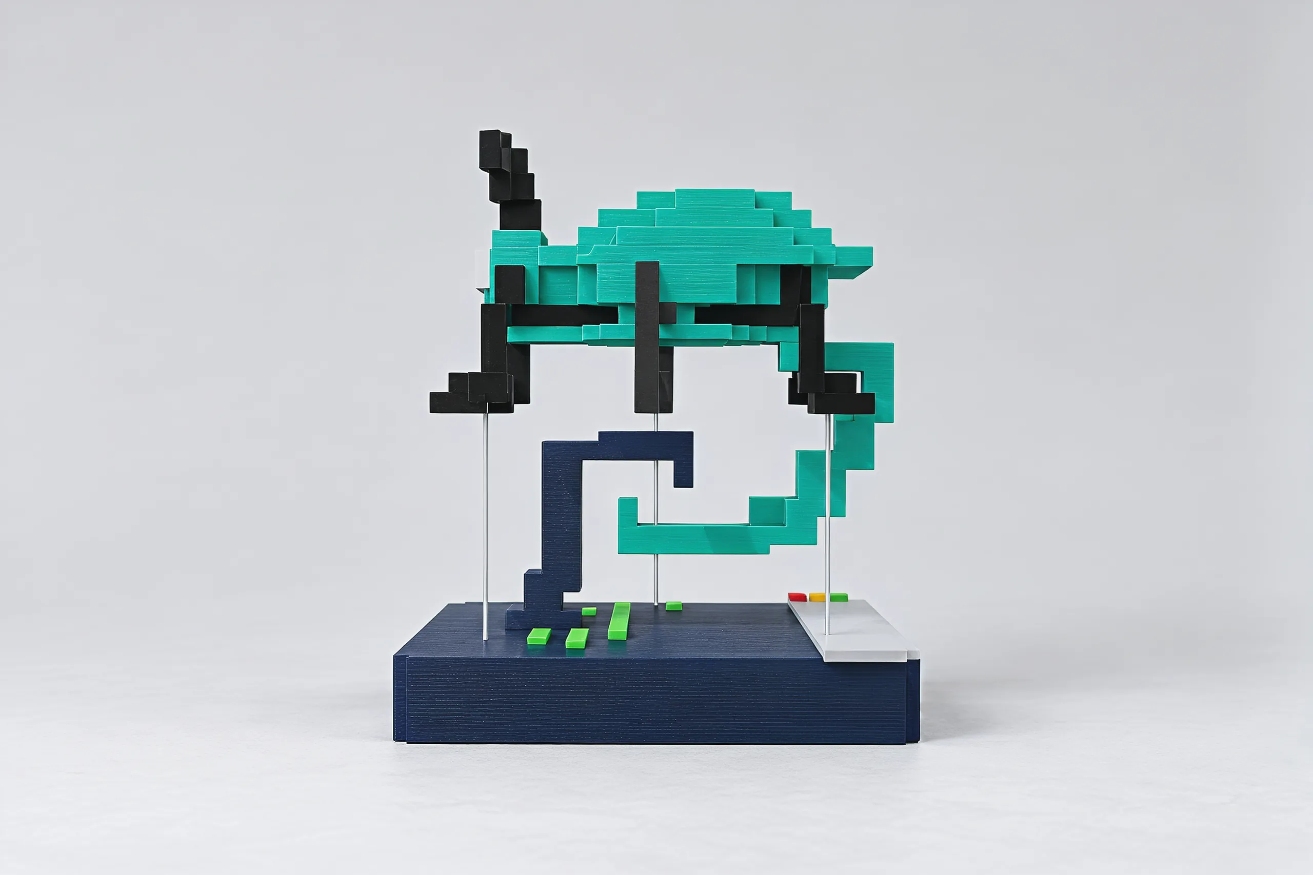 Side view: the navy hook and the teal hook sit one inside the other like a pair of brackets, the bug's dome above them