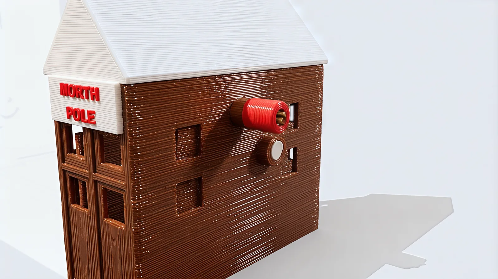 The North Pole tower's side with its brown crank arm and red knob