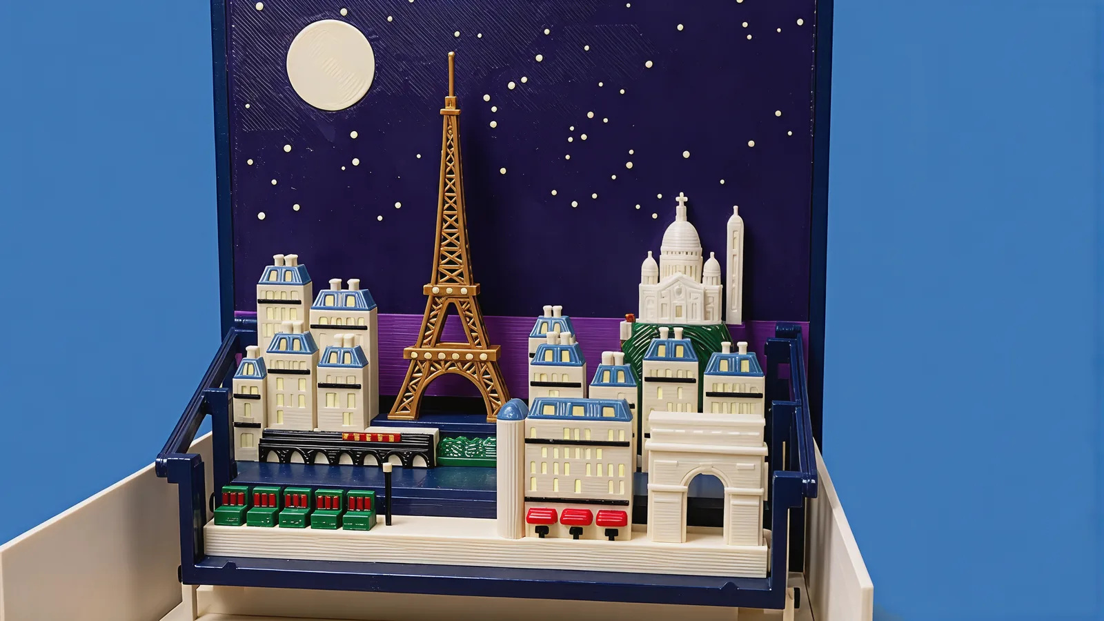 The open book with the Paris pack on its frames