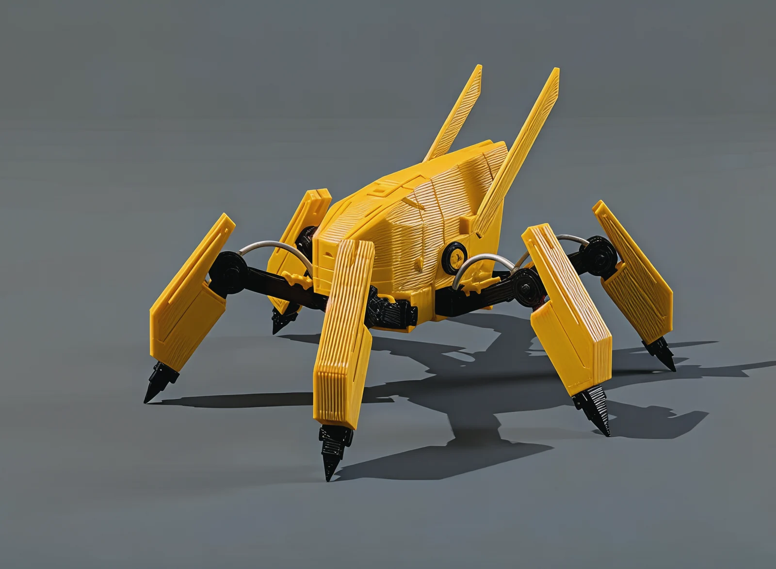 The machine from the other side, three-quarter view, across the yellow shells and shin guards