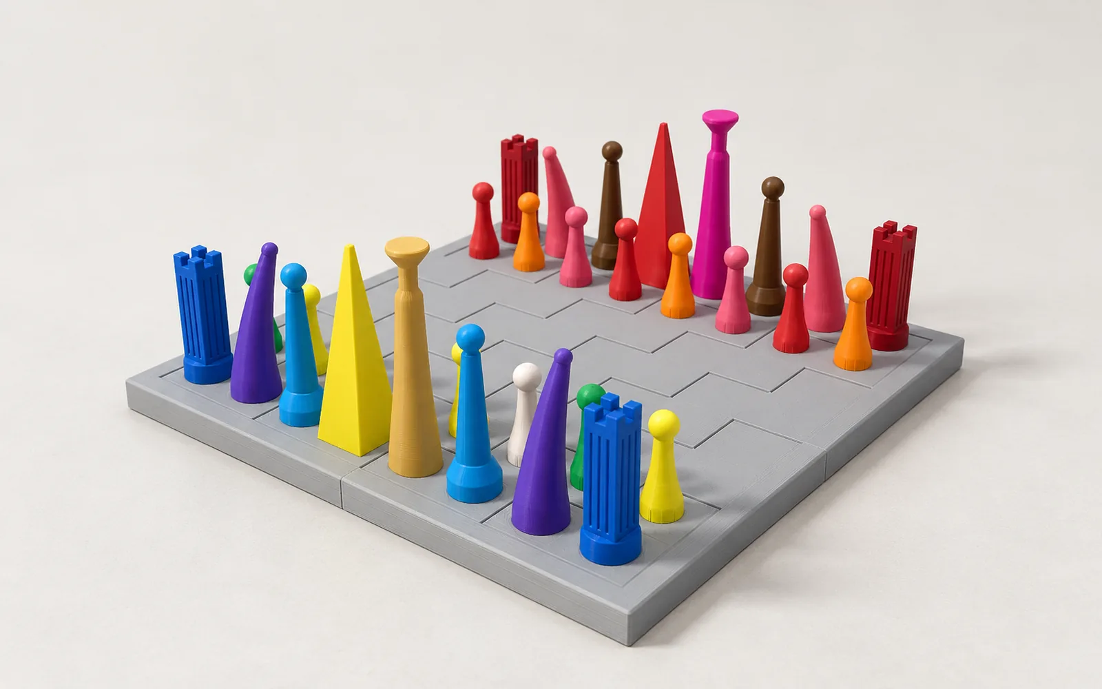 The full set on its grey board: blue rooks, purple knights, a yellow pyramid queen and a tan king on the near side; crimson, pink, red and magenta across