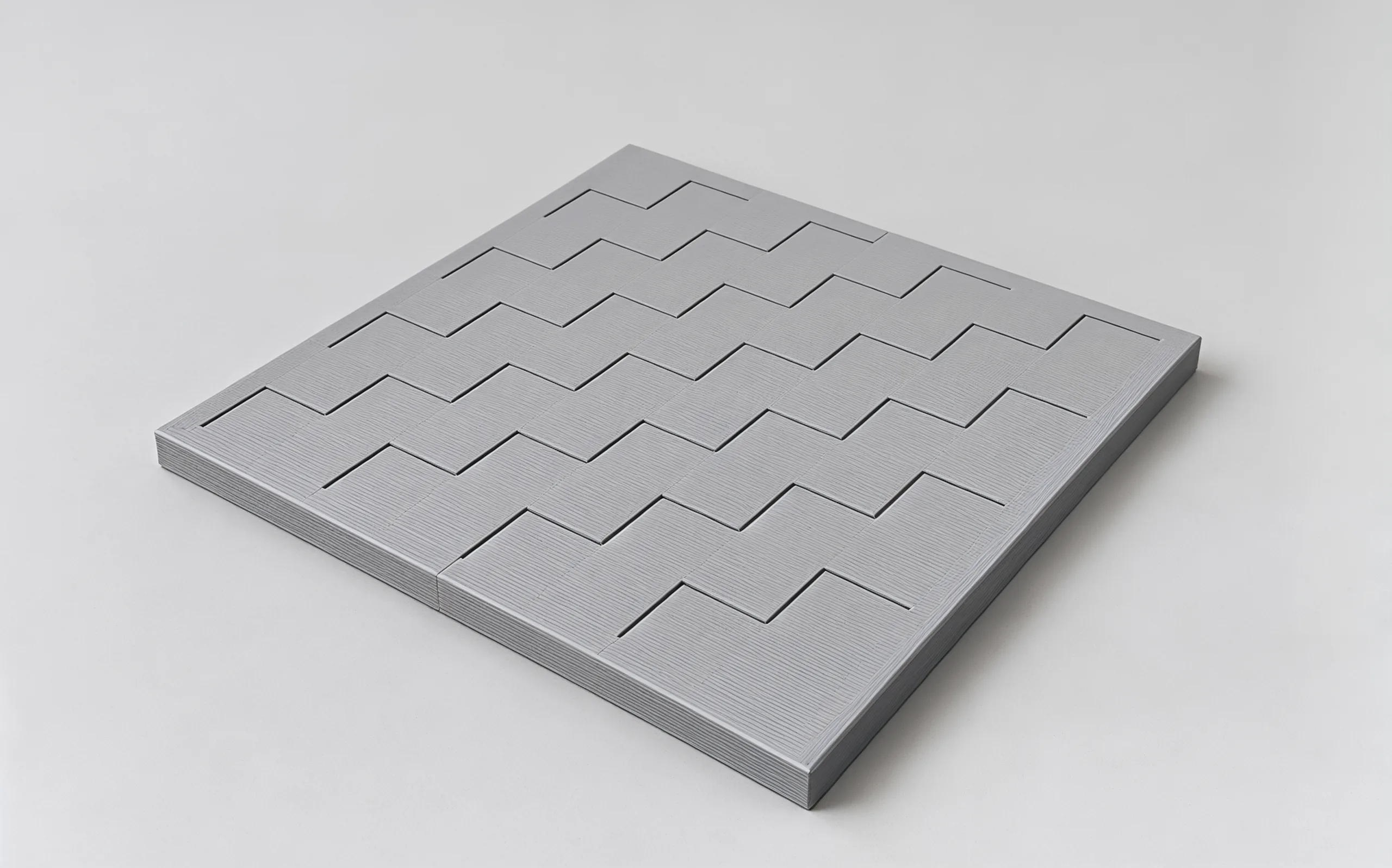 The empty board: one grey, the dark squares set slightly lower than the light ones