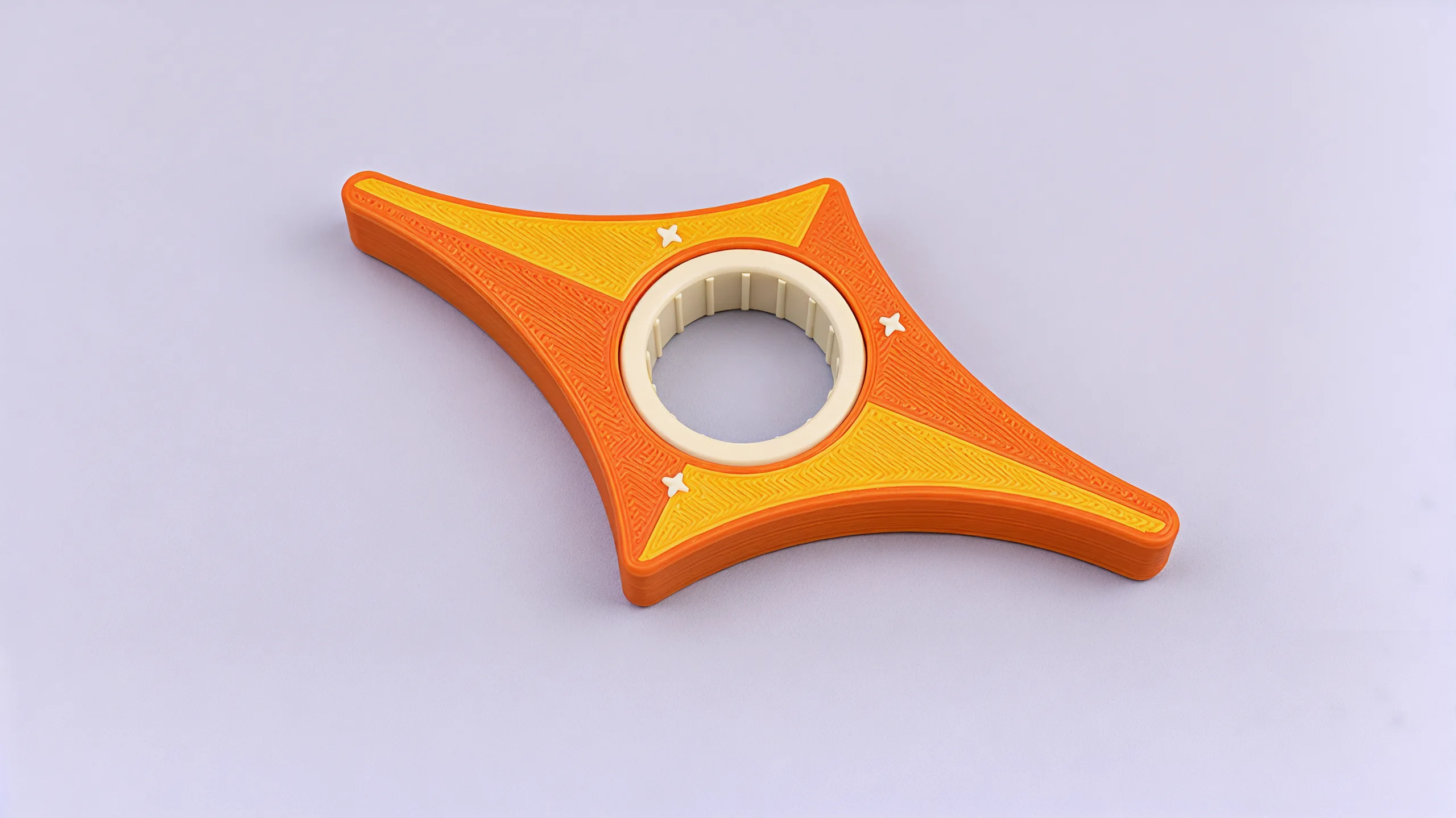 The star from above: two gold facets, two orange, three white sparkles and the cream ring