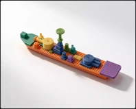 The drawing built as a printed toy barge with coloured deck cargo