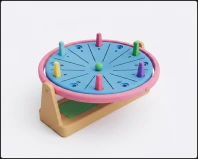 A printed round board game with pegs and a spinning centre